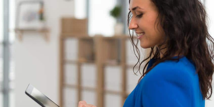 Woman using a tablet.