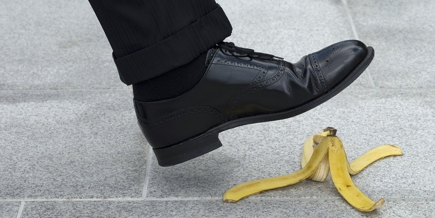 Person about to step on a banana peel.