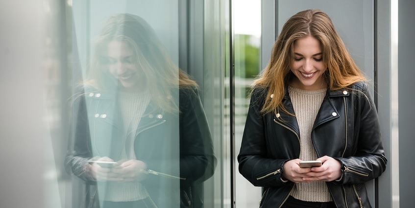 Woman using her mobile phone.